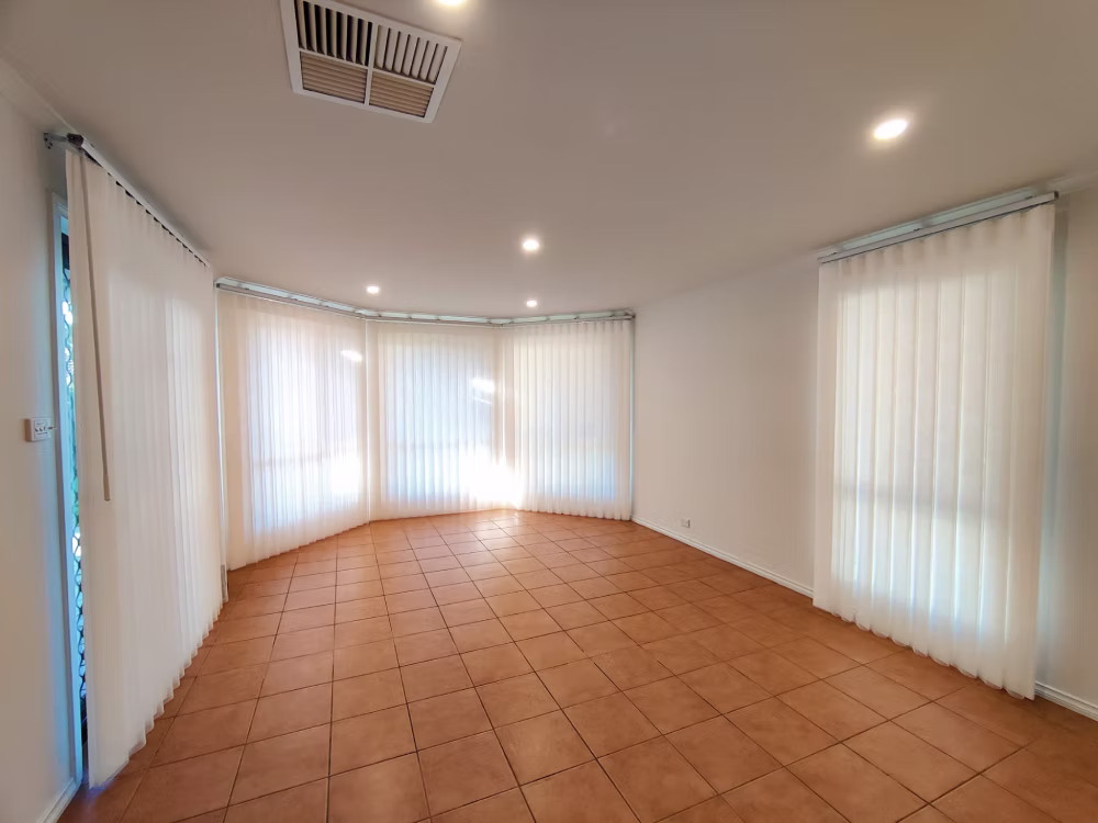 Modern vertical drapes for dining room windows