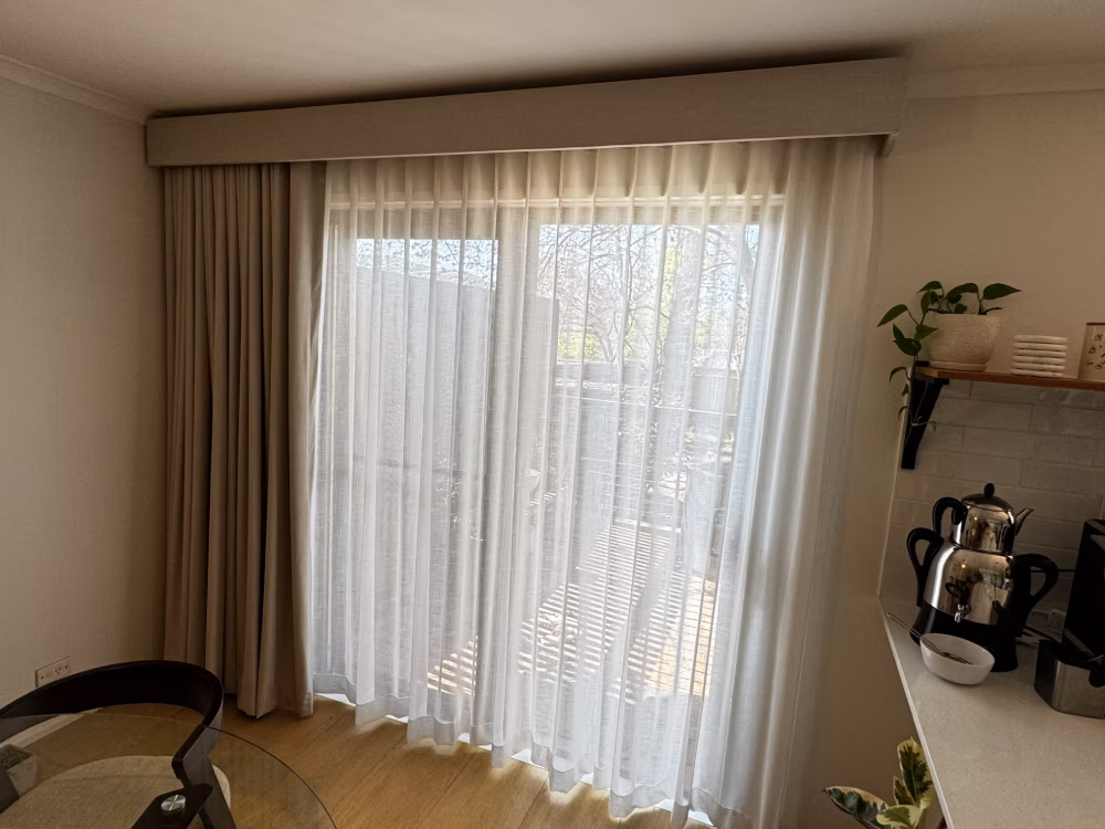 Ceiling mounted curtains for large glass doors