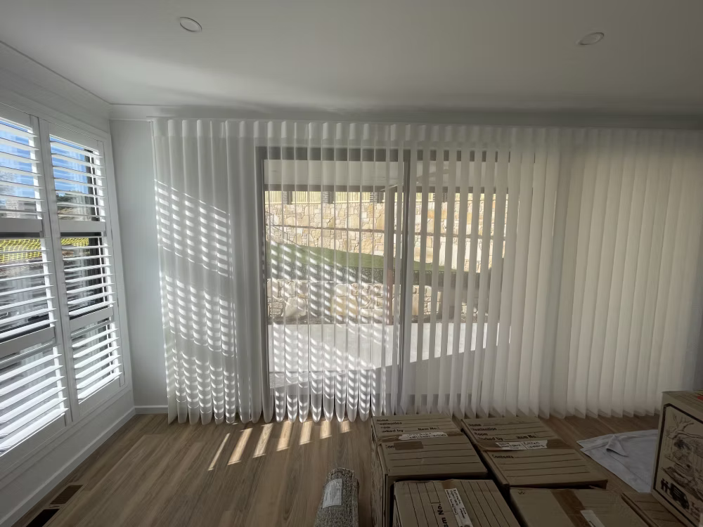 Modern vertical drapes for large living room windows