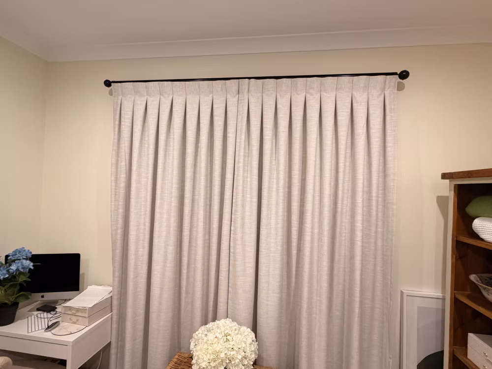 Modern white sheer curtains for open-plan living