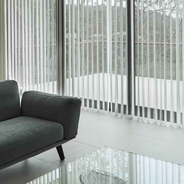Custom vertical drapes for floor-to-ceiling windows
