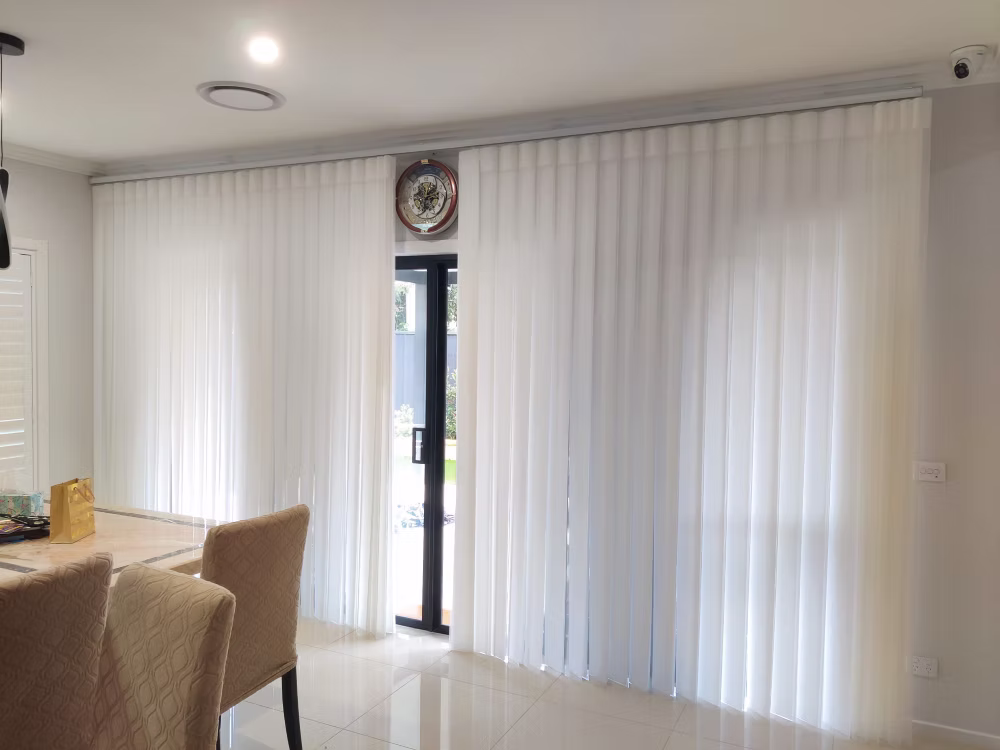 Vertical drapes installed in a modern Canberra home